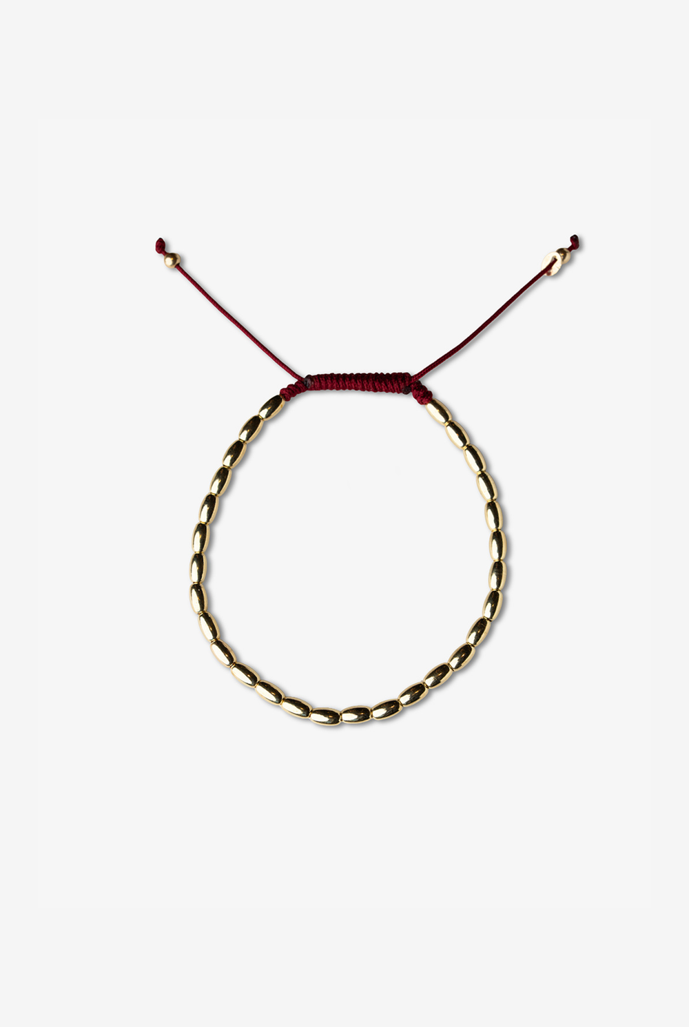 Pulseira em ouro amarelo com algodão bordeaux