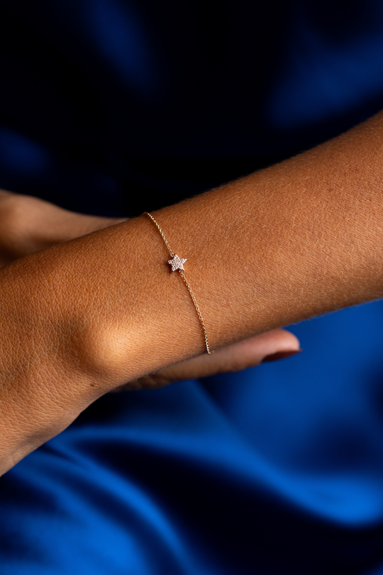 Pulseira de malha em ouro rosa com estrela em diamantes