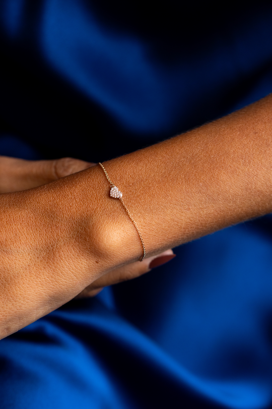 Pulseira de malha em ouro rosa com coração em diamantes