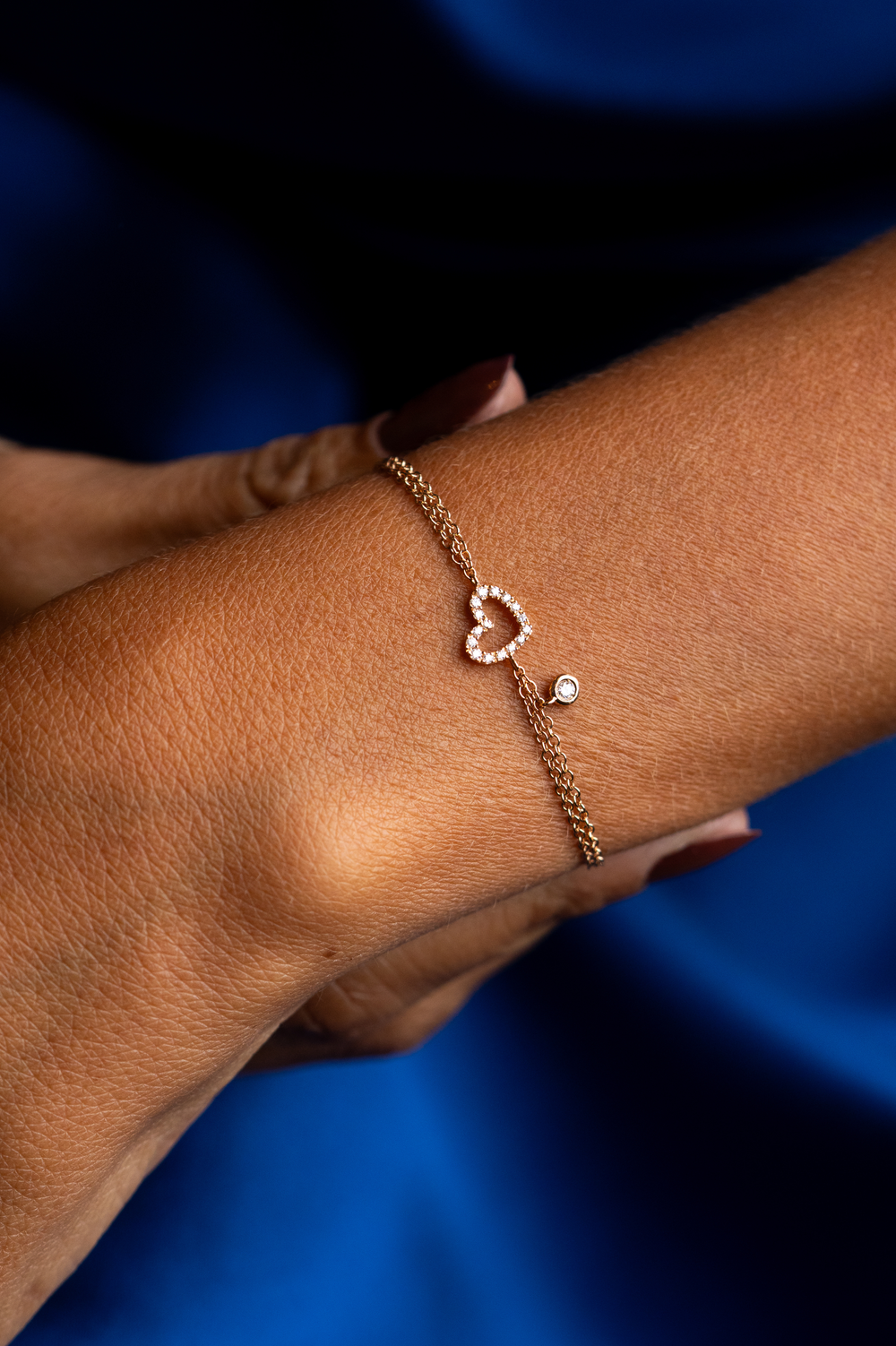 Pulseira de malha com coração em ouro rosa e diamantes