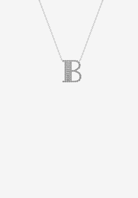Colar letra em ouro e diamantes