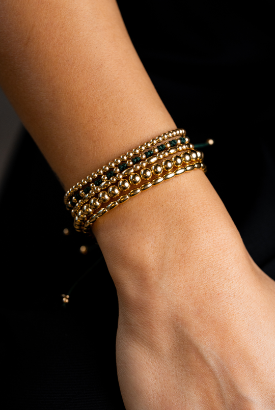 Pulseira às bolinhas em ouro amarelo com algodão verde escuro