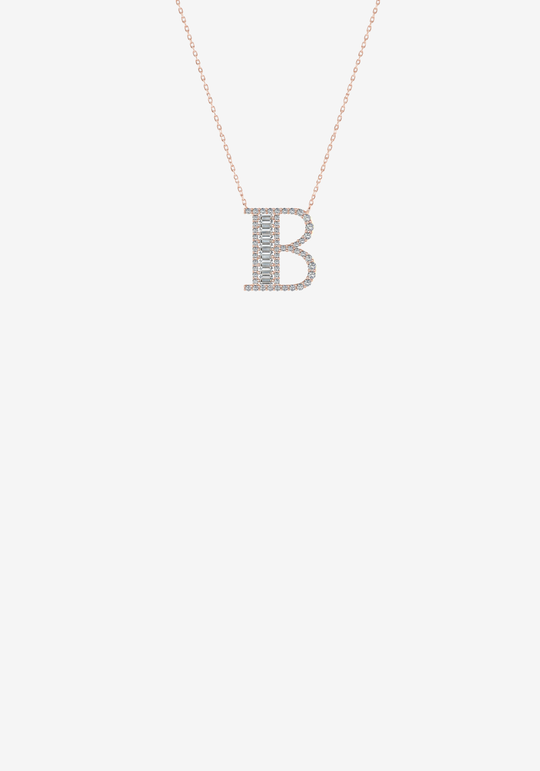 Colar letra em ouro e diamantes