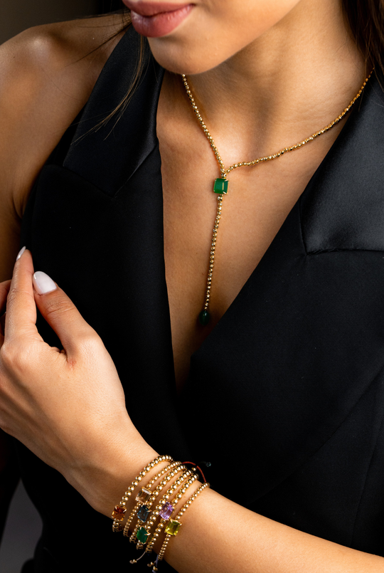 Pulseira em ouro amarelo com peridoto