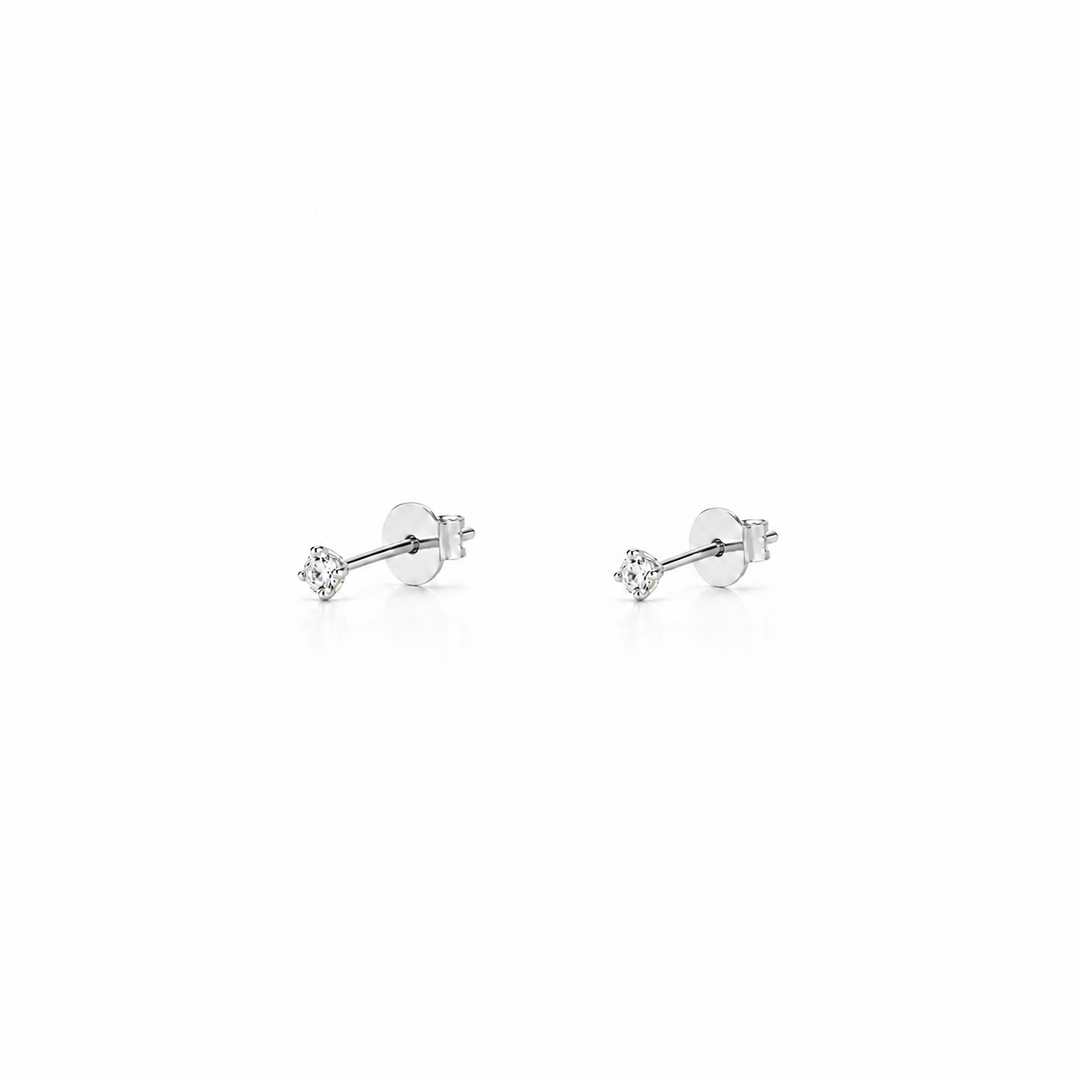 Brincos Solitários em Ouro Branco com Diamantes.