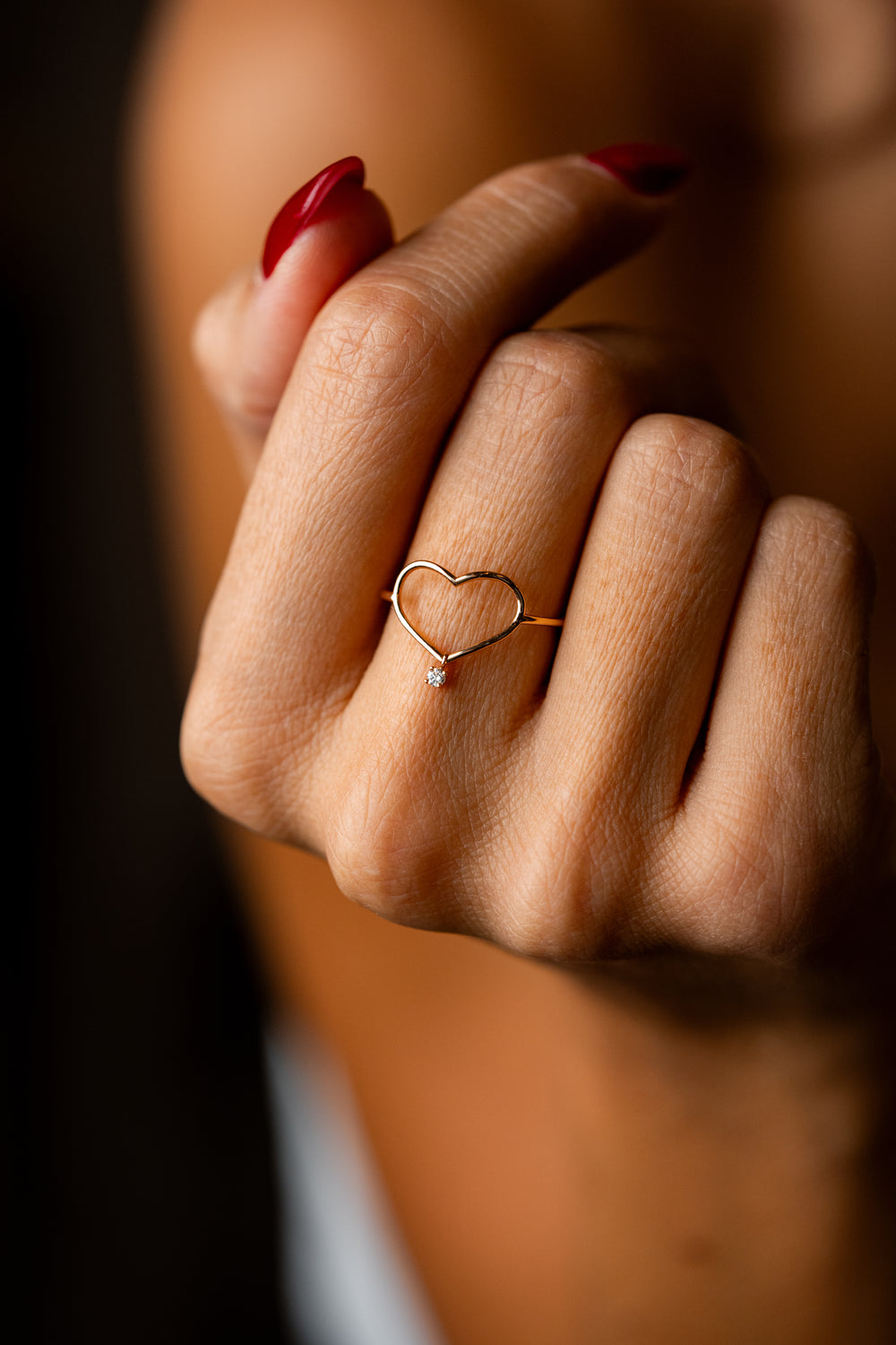 Anel coração com diamante solitário