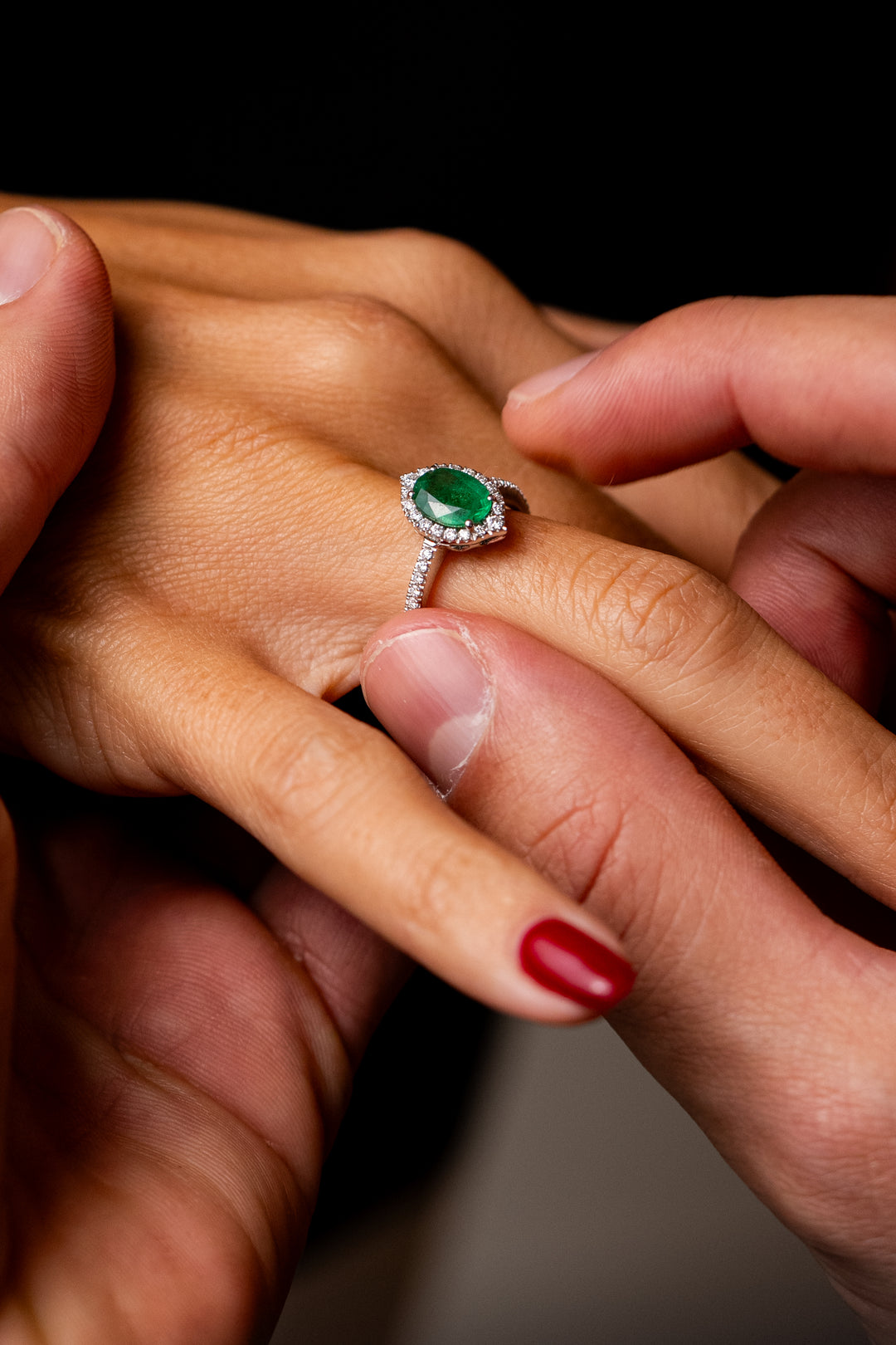White Gold Engagement Ring with Diamonds and Emerald
