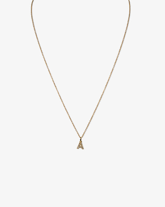 Colar letra em ouro e diamantes