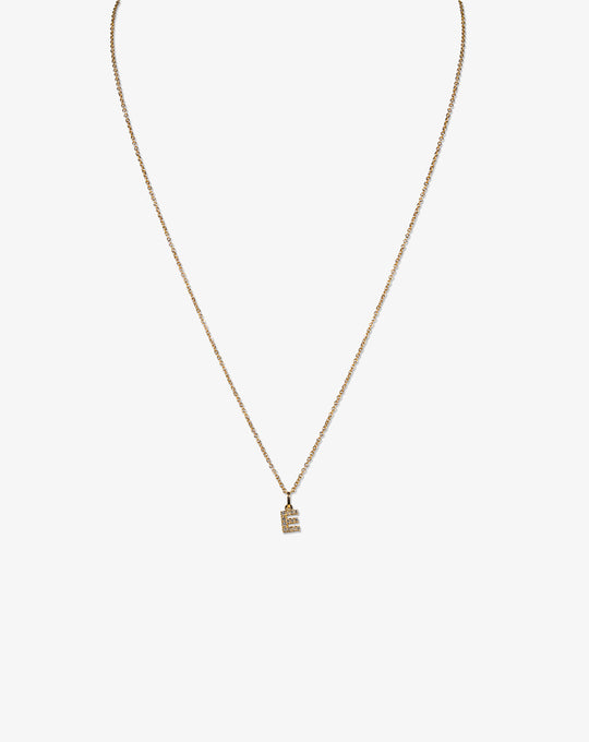 Colar letra em ouro e diamantes