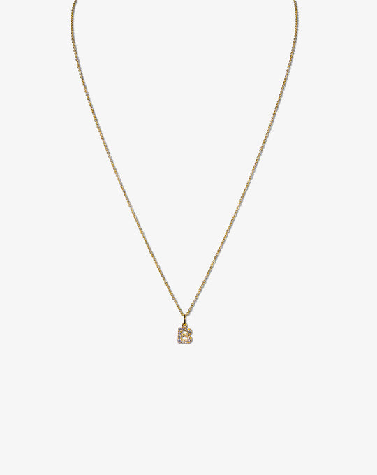 Colar letra em ouro e diamantes