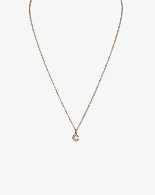 Colar letra em ouro e diamantes