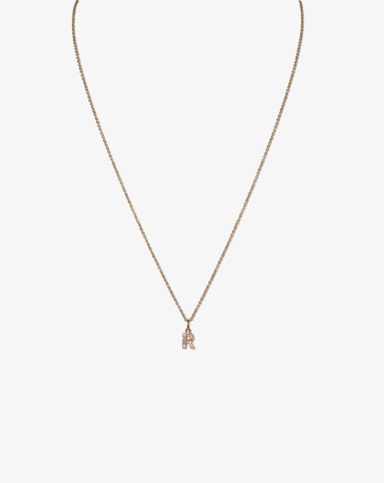 Colar letra em ouro e diamantes