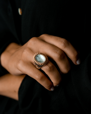 Silver Round Ring with Gold Chain and Crystal